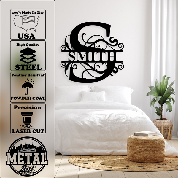 Split Letter Monogram in black powder coat displayed on a bedroom wall, showcasing its elegant design and high-quality steel craftsmanship.