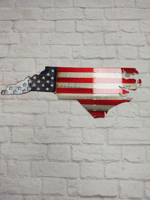 Handcrafted North Carolina state flag outline with red and blue stripes, featuring detailed stars on a textured background.